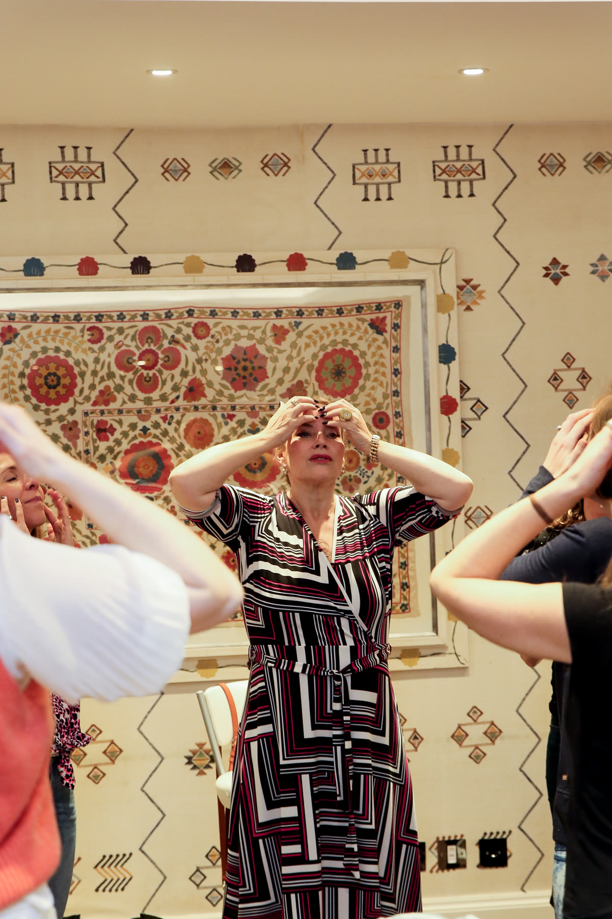 Juliette leading a room through an embodiment practice
