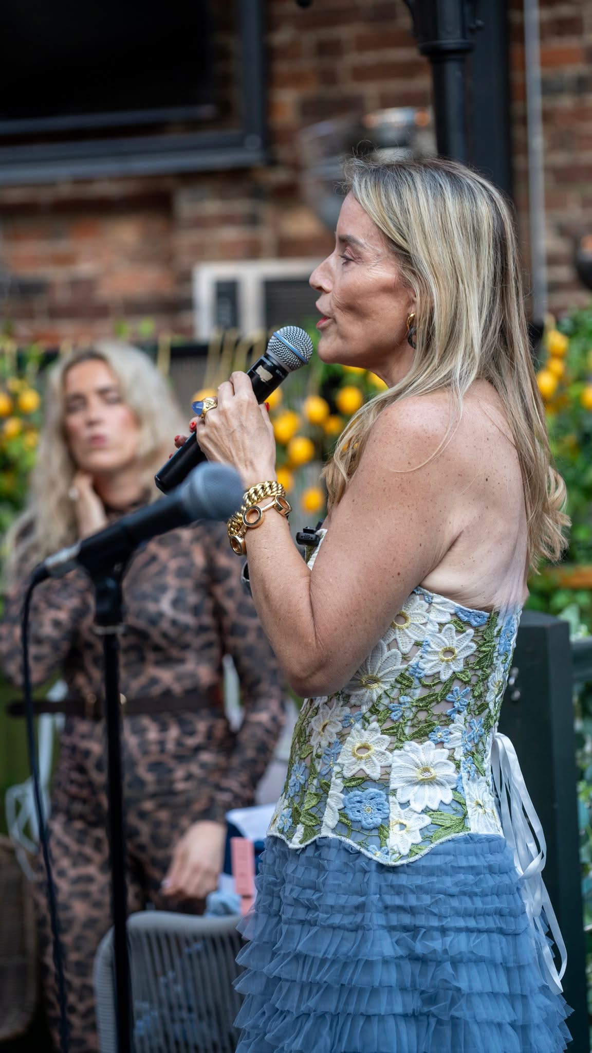 Juliette Karaman speaking to a live audience